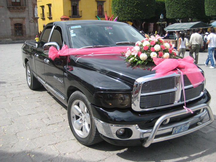 And then she's driven to her party in this stunning vehicle